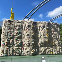 A climbing wall in the aerial park on top of the building