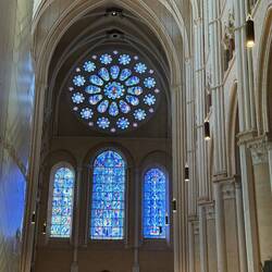 Entrance door. Light blue glass means 12th century