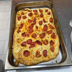 Finished focaccia. Tasted as good as it looks.