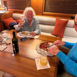 Preston tucks into a slice of my pepperoni