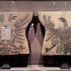 The double headed eagle indicates emperor while single indicates King