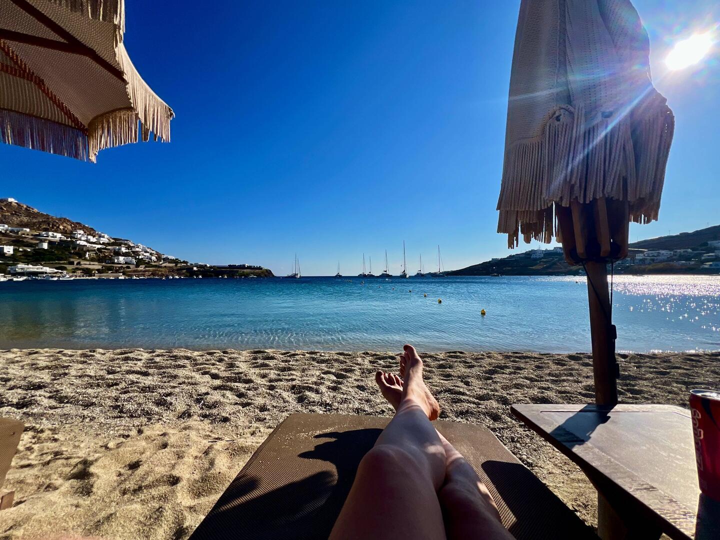Front row sunbed at Ornos beach.