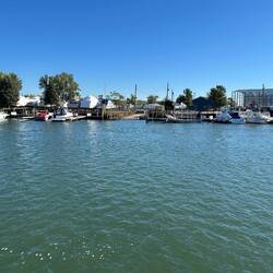 At a boatyard on the Calumet River, boats are wrapped and made ready for winter