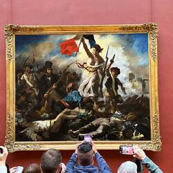Classic painting of Liberty leading the revolution! She might want to fix her wardrobe malfunction