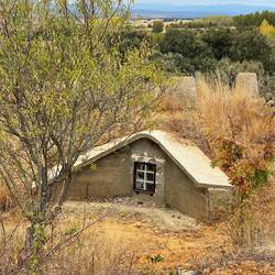 A cute little bodega...looks like a hobbit house.