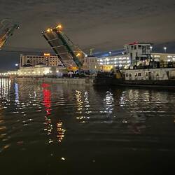 An overnight tug shoves past us on the wall in Joliet and heads upstream