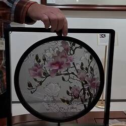 All silk, but the colors are different (pink on one side, white on reverse) w/ NO VISIBLE KNOTS!!