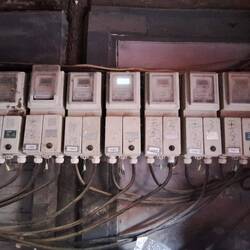 Electric boxes for the surrounding homes. Not really up to 'code'. :)