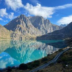 Morning reflections and a rare blue sky