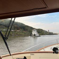 Passing a tug looking for another tow (running 'light engine', Preston and I call it)