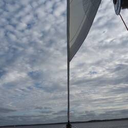 The jib sail being unfurling