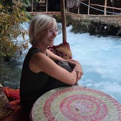 Sitting on a ledge overlooking the Salty river waiting for our Tachine dinner.