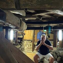 Stage-turning mechanism