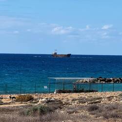 A ship wrecked out on the sandbar, there are a few of these dotted around Cyprus