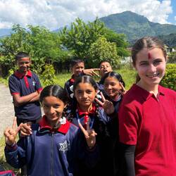 Peace Corps Volunteer Sarita with her students