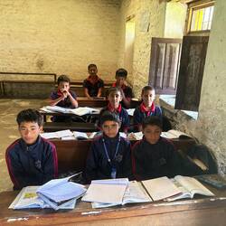 The boys posing serious at school