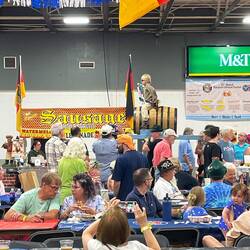 Parading a youngster around the hall