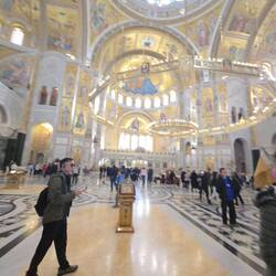 Parishioners stand for the hour or longer service