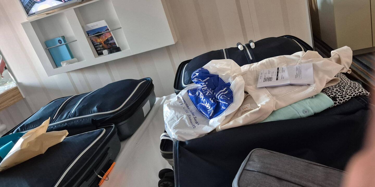 alle muss reinpassen. Ich habe nichts gekauft, Koffer wiegt 2 kg mehr??