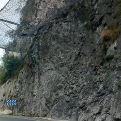 Stopping the rocks from landing on road.......rather worrying