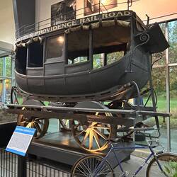 This early railroad car's parentage should be obvious