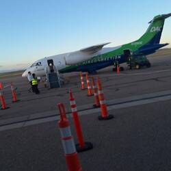 The small airplain flying to Pueblo