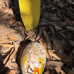 Another MATE egg - leaning on bicycle handlebars