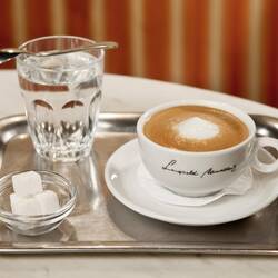 Served the traditional tray of unsweetened chocolate, sugar and water.