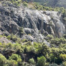 Mineral deposits below hot springs
