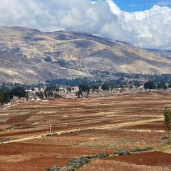 The pass is flat and fertile with potatoes being harvested
