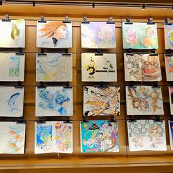 Hand drawings on a coffee shop wall.