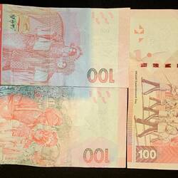 The reverse side of those same bills.