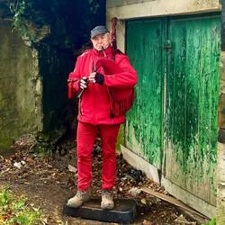 Bagpiper welcoming pilgrims to Galicia.