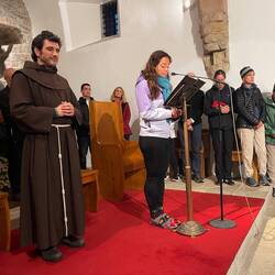Our friend Carolina reading the blessing in Portuguese.