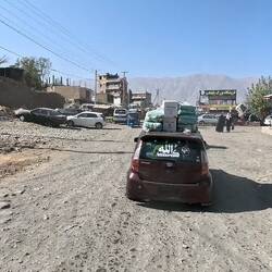 An image of the (still quite civilized) traffic in towns. Didn't know bebe yaks are allowed though.