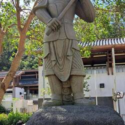 There are 12 of these guys all along the promenade leading to the base of the budda's stairs.