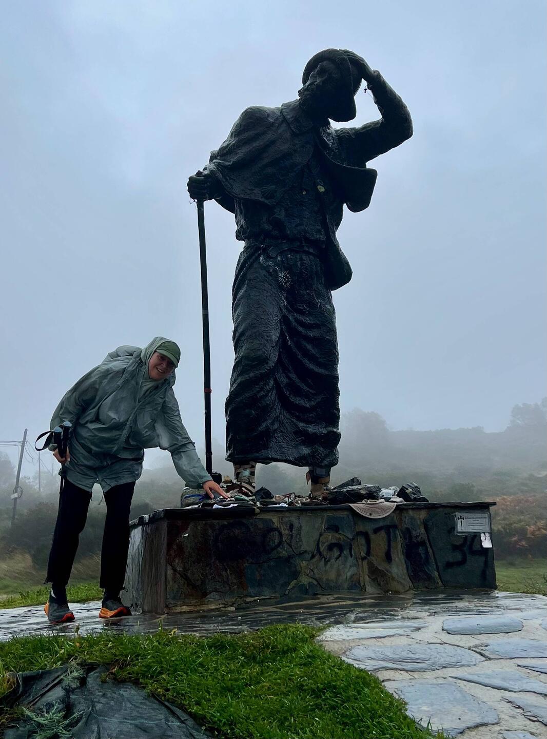 Saying hello to the pilgrim at Alto de San Roque, who greets pilgrims at 1270 meters (4166 feet).