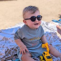 coolest kid on the beach 😎