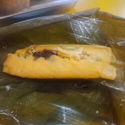 Tamales, Maisteig mit verschiedenen Füllungen