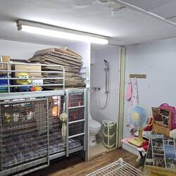 That upper-bunk area would typically be another 'caged' area like the lower bunk.