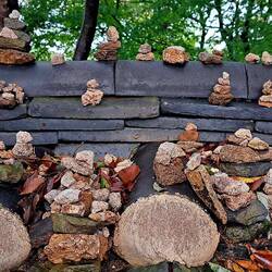 Pick up a rock (from the ground), make a either & place it on a rock. Lots of wishes here!