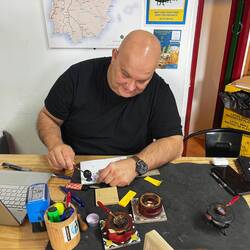 Marcello pouring wax for my stamp,