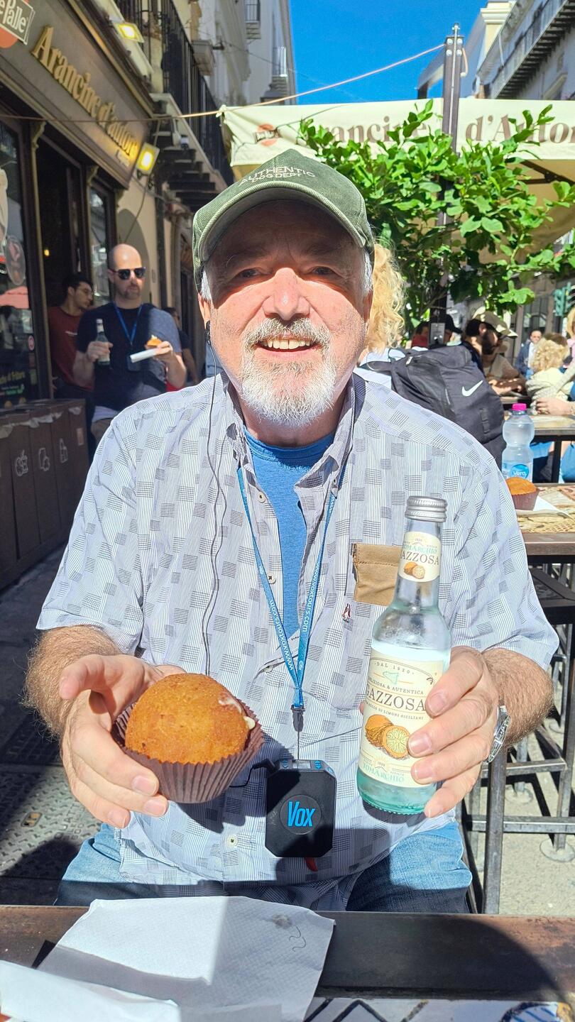 Arancino (deep-fried rice ball stuffed with ham and cheese)