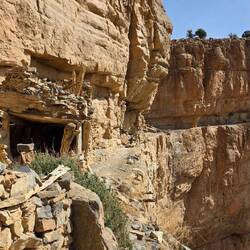 Ledge coming from right with the first storage house