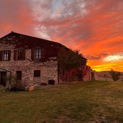 Sunset at our Agriturismo. Our suite is up those steps and the rear half of the house.