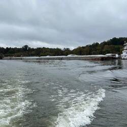 We're past. His helm is hard to port to bring the rear of that tow over to the curve in the river