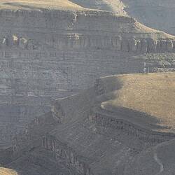 Canyons ripped into the earth's surface indicate what masses of water this continent once had