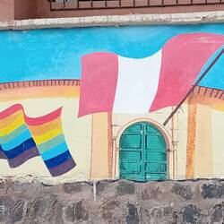 The same mural into modern times. Peru (red-white red) and Cusco (rainbow) flags are shown