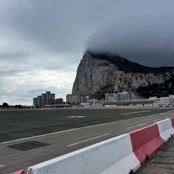 To get into Gibraltar you got to cross a runway