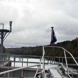 Waiting to drop and looking at an osprey nest